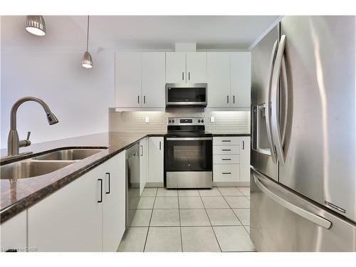 509-1980 Imperial Way, Burlington, ON - Indoor Photo Showing Kitchen With Stainless Steel Kitchen With Double Sink With Upgraded Kitchen