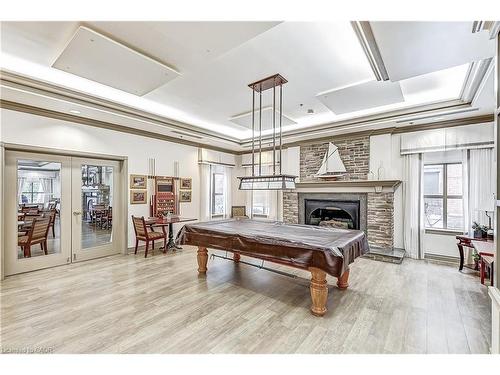 2509-100 Burloak Drive, Burlington, ON - Indoor With Fireplace