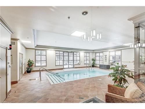 2509-100 Burloak Drive, Burlington, ON - Indoor Photo Showing Other Room With In Ground Pool