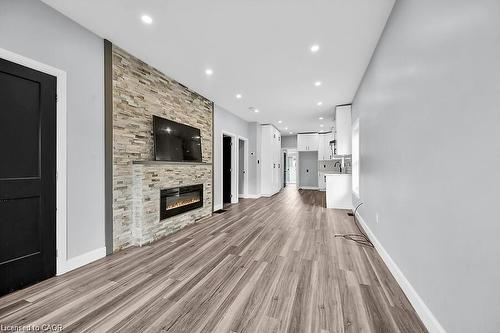 16 Webling Street, Brantford, ON - Indoor Photo Showing Other Room With Fireplace