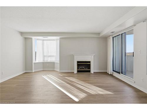 802-1272 Ontario Street, Burlington, ON - Indoor Photo Showing Living Room With Fireplace