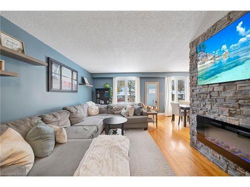 31 Raleigh Street, Hamilton, ON - Indoor Photo Showing Living Room With Fireplace