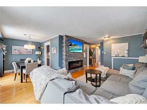 31 Raleigh Street, Hamilton, ON - Indoor Photo Showing Living Room With Fireplace