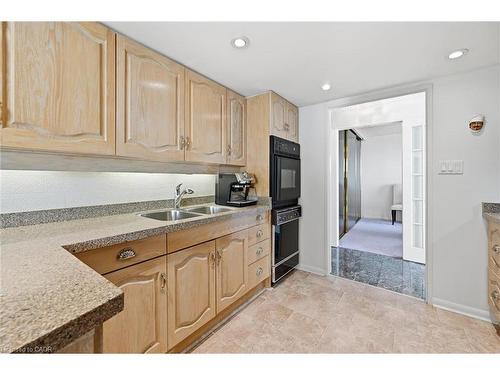 1808-2170 Marine Drive, Oakville, ON - Indoor Photo Showing Kitchen With Double Sink