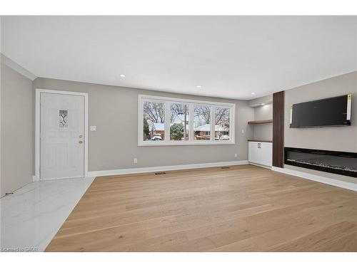 84 Blanmora Drive, Hamilton, ON - Indoor Photo Showing Other Room With Fireplace