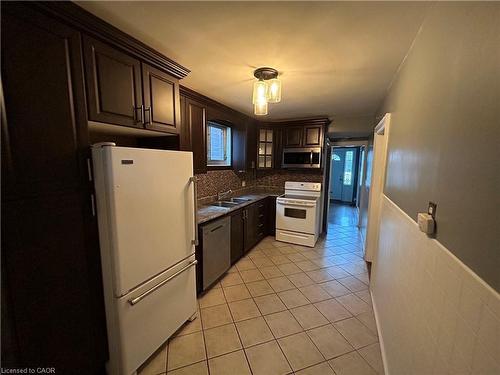 77 Ottawa Street S, Hamilton, ON - Indoor Photo Showing Kitchen With Double Sink
