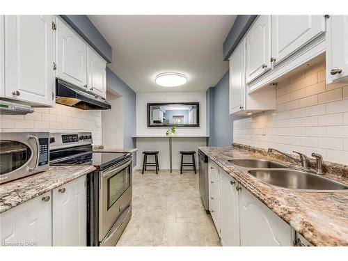 14-1548 Newlands Crescent, Burlington, ON - Indoor Photo Showing Kitchen With Double Sink