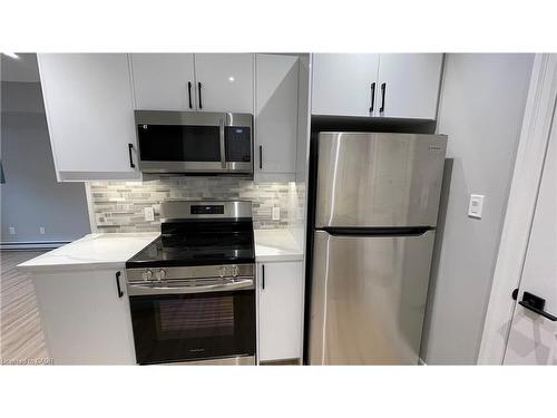 102-69 East Main Street, Welland, ON - Indoor Photo Showing Kitchen With Stainless Steel Kitchen