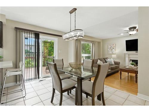 49 Johnson Crescent, Georgetown, ON - Indoor Photo Showing Dining Room With Fireplace