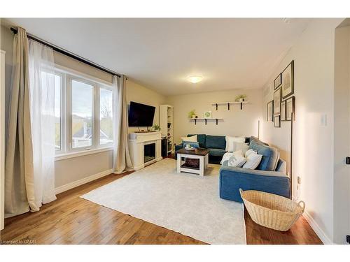 213 Falcon Drive, Woodstock, ON - Indoor Photo Showing Living Room With Fireplace