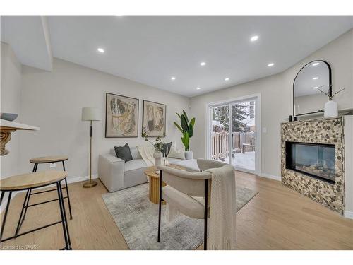 540 Mariner Drive, Waterloo, ON - Indoor Photo Showing Other Room With Fireplace