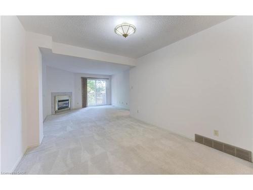 5-523 Beechwood Drive, Waterloo, ON - Indoor With Fireplace