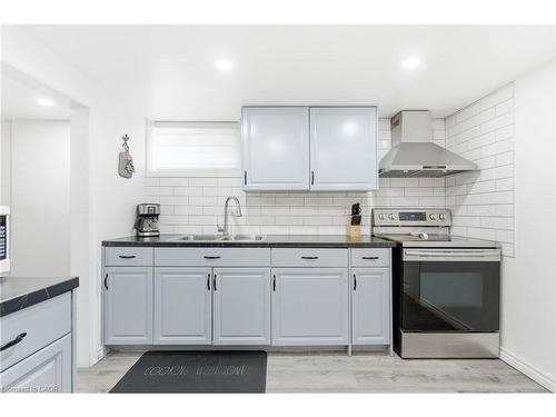 18 Ferrie Street W, Hamilton, ON - Indoor Photo Showing Kitchen With Double Sink