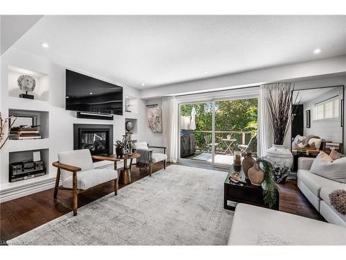 47-635 Saginaw Parkway, Cambridge, ON - Indoor Photo Showing Living Room With Fireplace