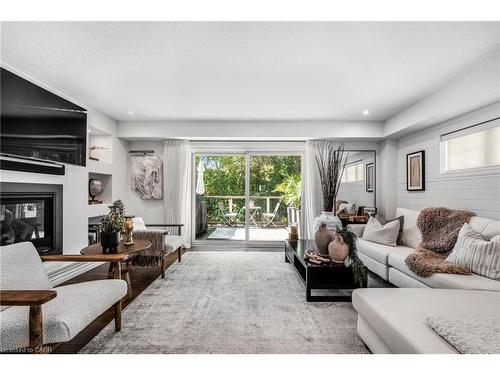 47-635 Saginaw Parkway, Cambridge, ON - Indoor Photo Showing Living Room With Fireplace