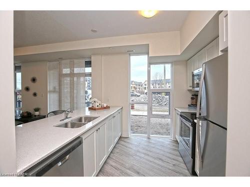 108-10 Concord Place, Grimsby, ON - Indoor Photo Showing Kitchen With Double Sink