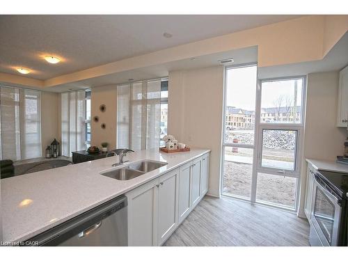 108-10 Concord Place, Grimsby, ON - Indoor Photo Showing Kitchen With Double Sink