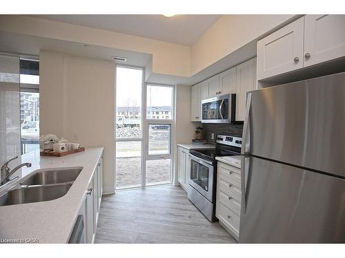 108-10 Concord Place, Grimsby, ON - Indoor Photo Showing Kitchen With Double Sink