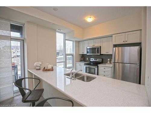 108-10 Concord Place, Grimsby, ON - Indoor Photo Showing Kitchen With Double Sink With Upgraded Kitchen