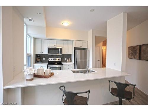 108-10 Concord Place, Grimsby, ON - Indoor Photo Showing Kitchen With Double Sink With Upgraded Kitchen