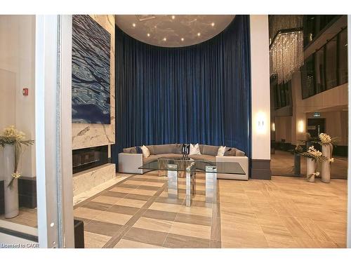 108-10 Concord Place, Grimsby, ON - Indoor Photo Showing Other Room With Fireplace