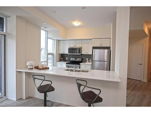 108-10 Concord Place, Grimsby, ON - Indoor Photo Showing Kitchen With Double Sink