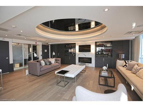 108-10 Concord Place, Grimsby, ON - Indoor Photo Showing Living Room With Fireplace