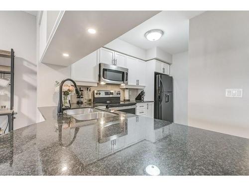 701-4080 Living Arts Drive, Mississauga, ON - Indoor Photo Showing Kitchen With Double Sink With Upgraded Kitchen