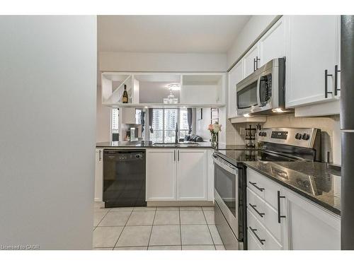 701-4080 Living Arts Drive, Mississauga, ON - Indoor Photo Showing Kitchen