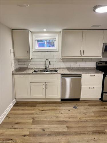 Lowerlevel-64 West 25Th Street, Hamilton, ON - Indoor Photo Showing Kitchen With Double Sink