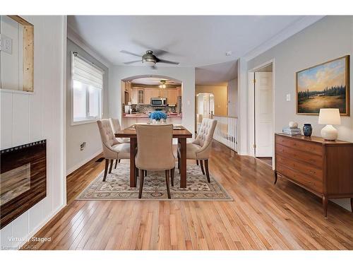 13-694 Grey Street, Brantford, ON - Indoor Photo Showing Dining Room With Fireplace