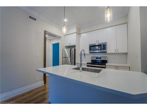 101-100 Charlton Avenue W, Hamilton, ON - Indoor Photo Showing Kitchen With Stainless Steel Kitchen With Double Sink With Upgraded Kitchen