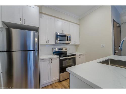101-100 Charlton Avenue W, Hamilton, ON - Indoor Photo Showing Kitchen With Stainless Steel Kitchen