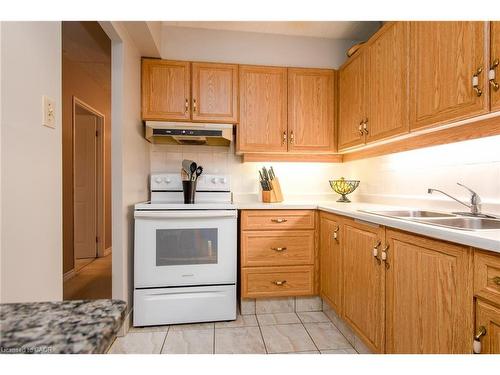 104-71 Vanier Drive, Kitchener, ON - Indoor Photo Showing Kitchen With Double Sink