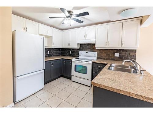Lower-79 Munroe Crescent, Guelph, ON - Indoor Photo Showing Kitchen With Double Sink