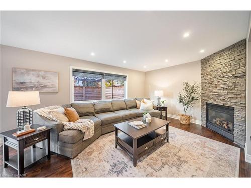 1351 Mcguffin Gate, Milton, ON - Indoor Photo Showing Living Room With Fireplace