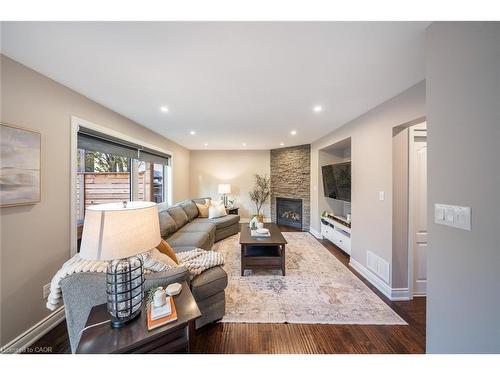 1351 Mcguffin Gate, Milton, ON - Indoor Photo Showing Living Room With Fireplace
