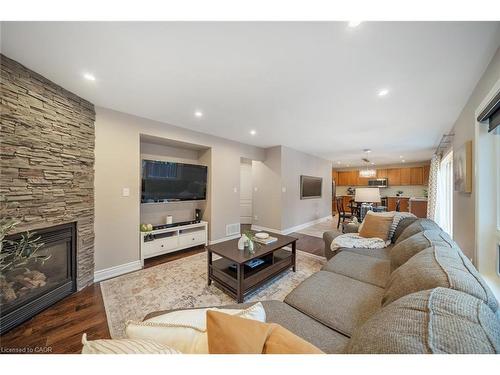 1351 Mcguffin Gate, Milton, ON - Indoor Photo Showing Living Room With Fireplace