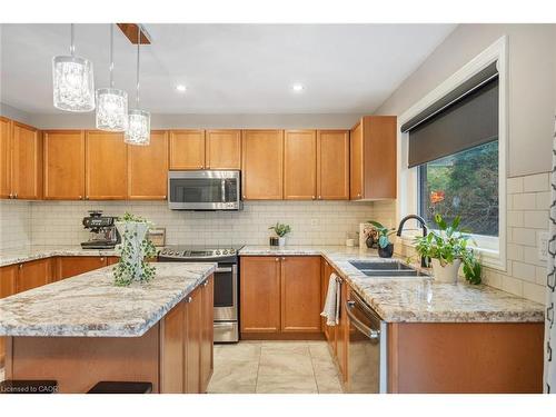 1351 Mcguffin Gate, Milton, ON - Indoor Photo Showing Kitchen With Double Sink With Upgraded Kitchen