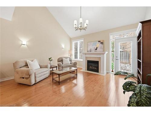 99-2125 Itabashi Way, Burlington, ON - Indoor Photo Showing Living Room With Fireplace