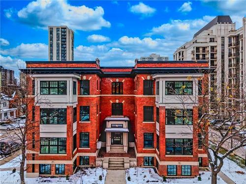 Ll04-100 Charlton Avenue W, Hamilton, ON - Outdoor With Facade