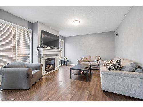 20 Gillespie Drive, Brantford, ON - Indoor Photo Showing Living Room With Fireplace