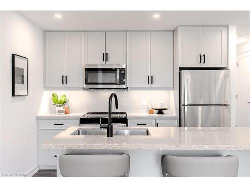 243 Burke Street, Waterdown, ON - Indoor Photo Showing Kitchen With Stainless Steel Kitchen With Double Sink With Upgraded Kitchen