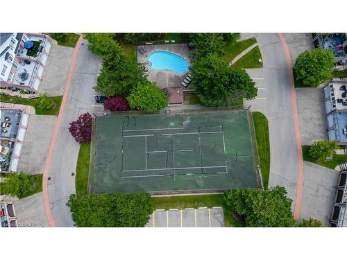 4-493 Beechwood Drive, Waterloo, ON - Outdoor With In Ground Pool