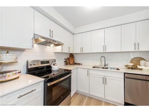 60-62 Delawana Drive, Hamilton, ON - Indoor Photo Showing Kitchen With Stainless Steel Kitchen With Double Sink