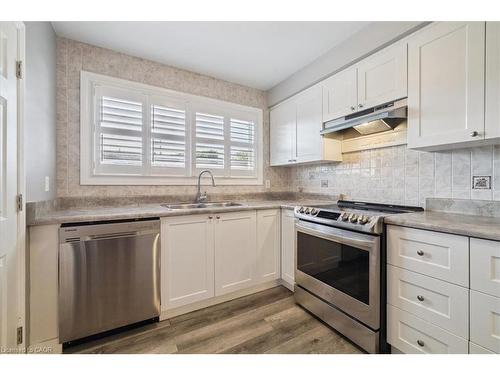 15 Purdy Crescent, Hamilton, ON - Indoor Photo Showing Kitchen With Double Sink