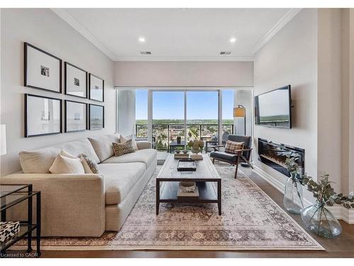 1010-1880 Gordon Street, Guelph, ON - Indoor Photo Showing Living Room With Fireplace