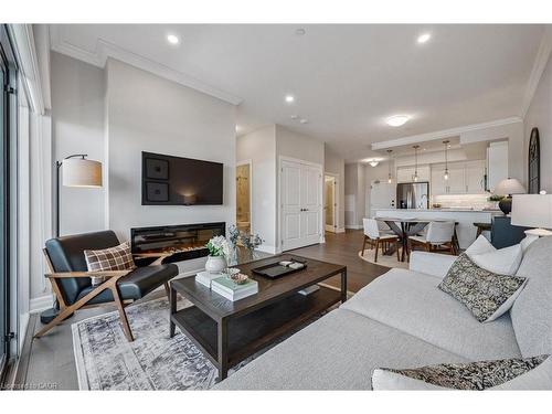 1010-1880 Gordon Street, Guelph, ON - Indoor Photo Showing Living Room With Fireplace
