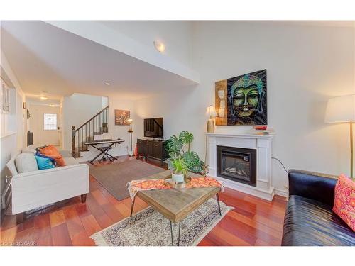 447 Brigantine Drive, Waterloo, ON - Indoor Photo Showing Living Room With Fireplace