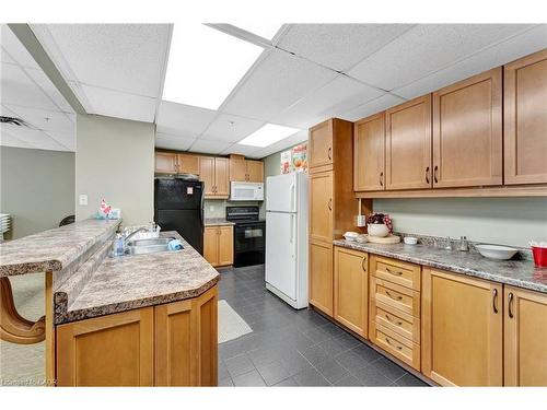 506-1770 Main Street W, Hamilton, ON - Indoor Photo Showing Kitchen With Double Sink